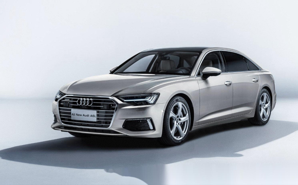 Luxury car driving on scenic road