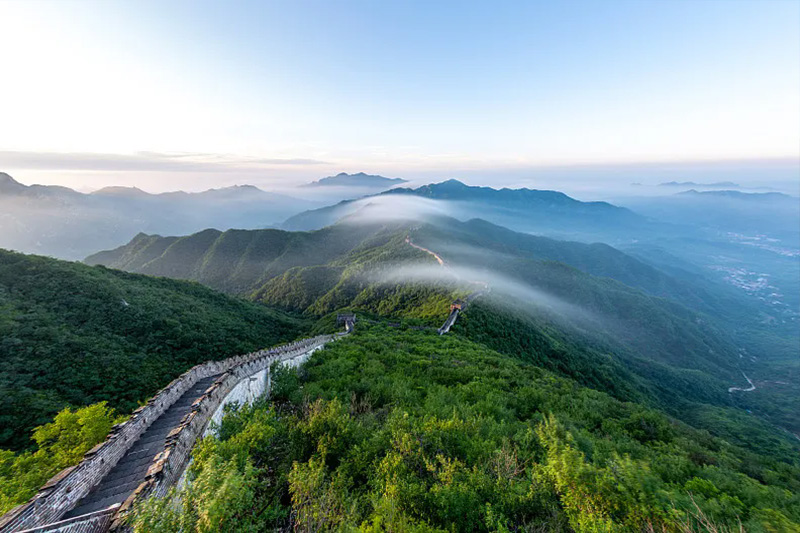 Mutianyu Great Wall snaking over forested mountain ridges