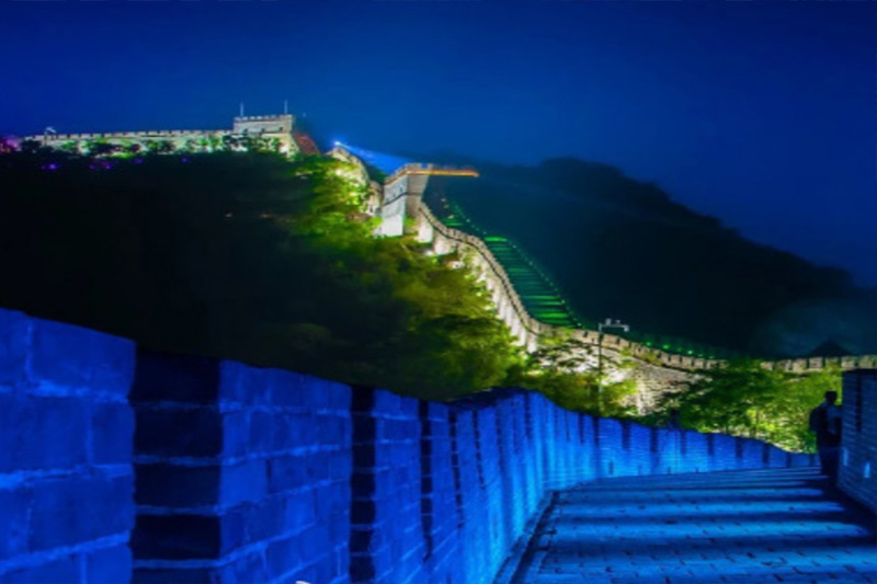 Mutianyu Great Wall lit up at sunset